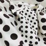 Tela Punto de Licra Estampado Lunares Blanco y Marrón